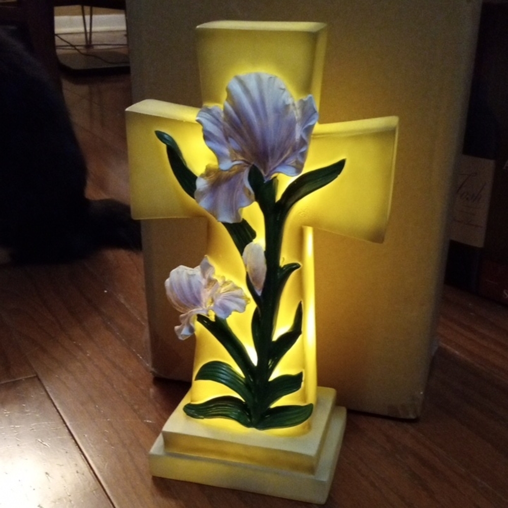 Illuminated Cross with Purple Iris Flowers
